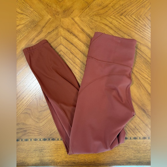 Lululemon high rise tight leggings rust color with mesh at bottom - Picture 2 of 3